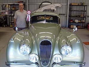 Rafi with Best Of Show Winner ribbon 1952 XK120 Coupe